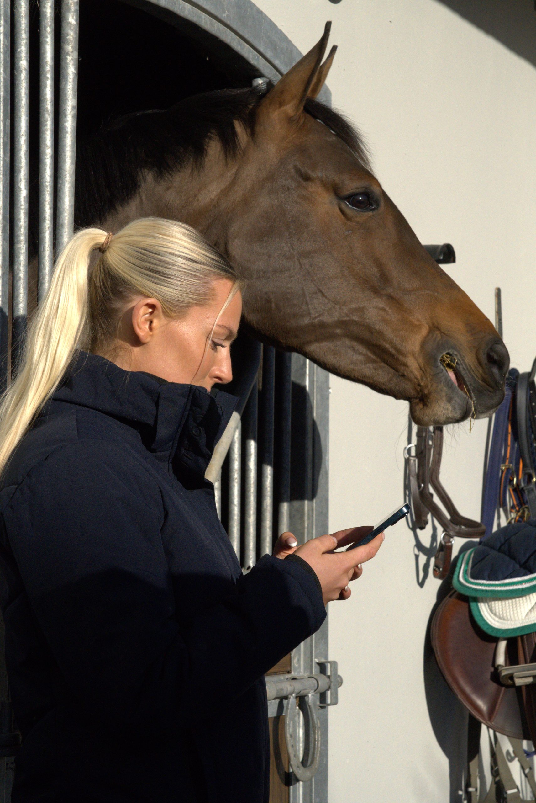Woman with horse using Apeiron app